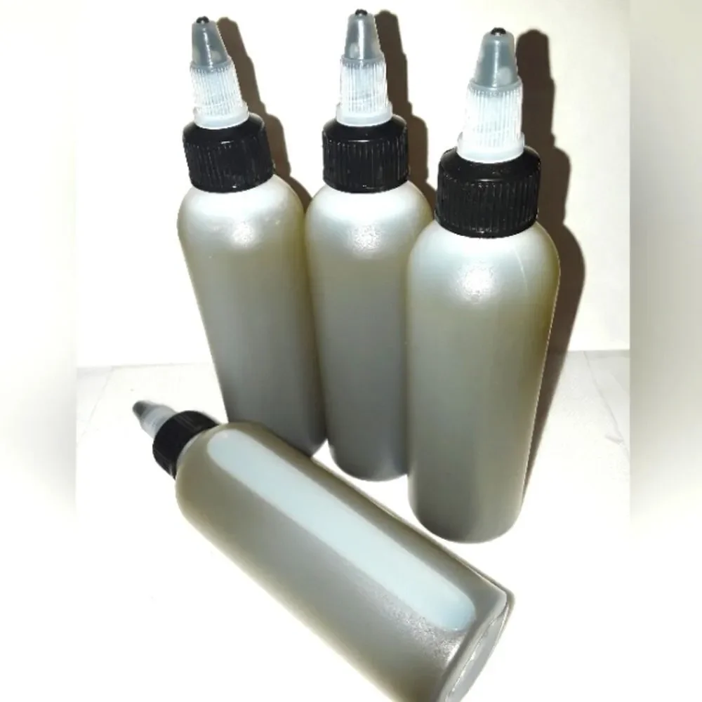 HAND crafted Neem and Amla hair and body oil